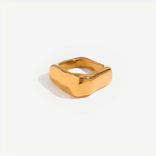 Gold ring on a white background