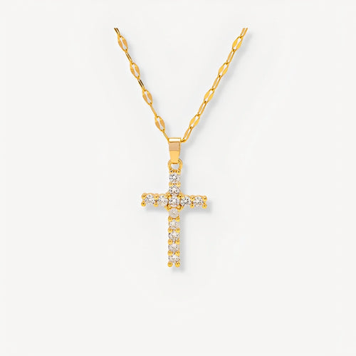 Gold cross necklace with diamonds on a white background
