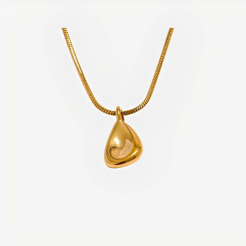 Gold teardrop pendant necklace on a white background