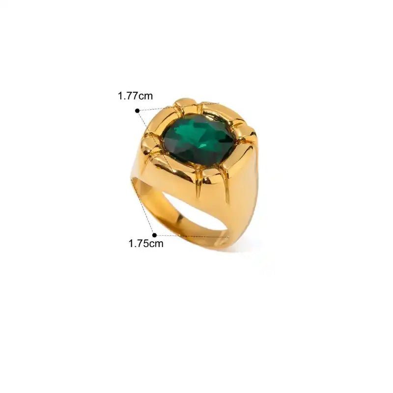 Gold ring with a green gemstone and measurements on a white background