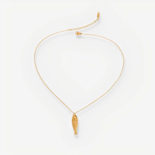 Gold necklace with a fish pendant on a white background