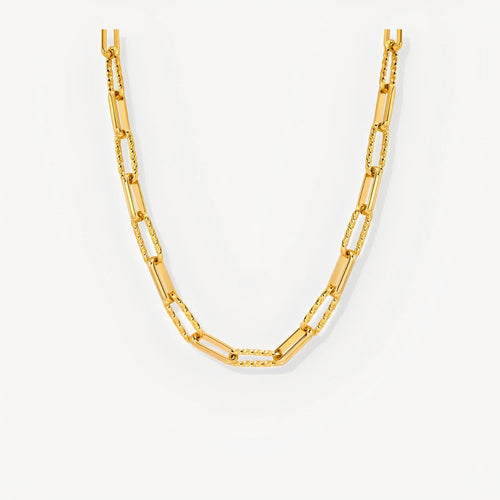 Gold chain necklace on a white background