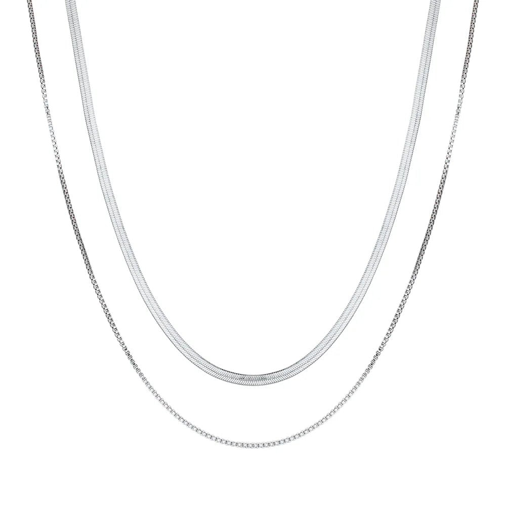 Two silver chain necklaces on a white background