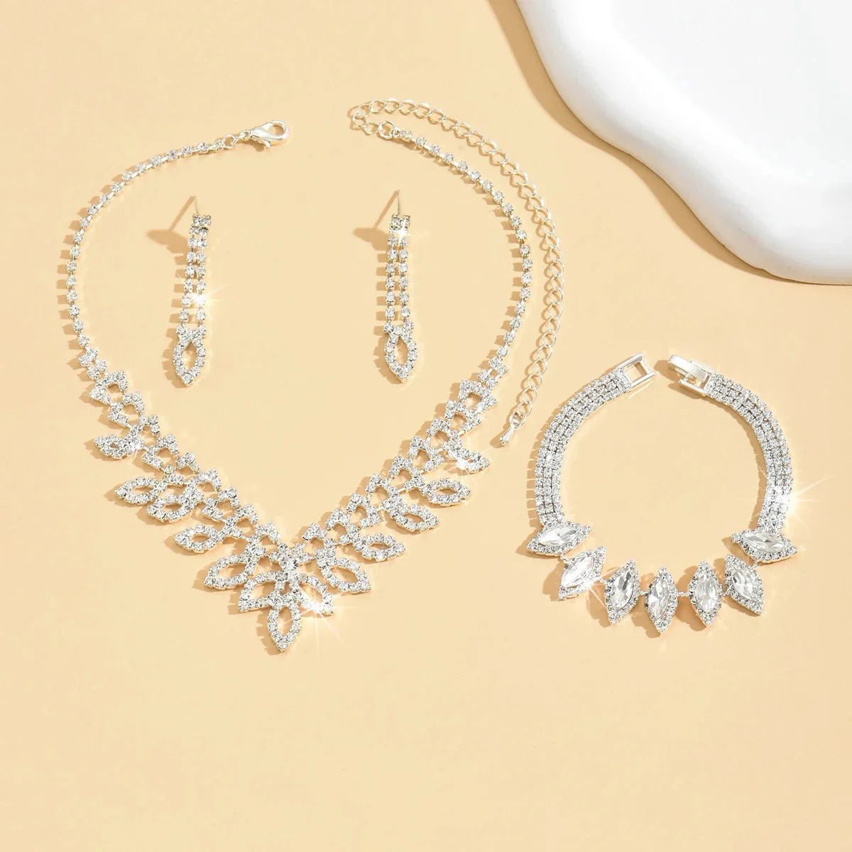 Shimmering Oval Diamond Necklace, Bracelet, and Earring Set