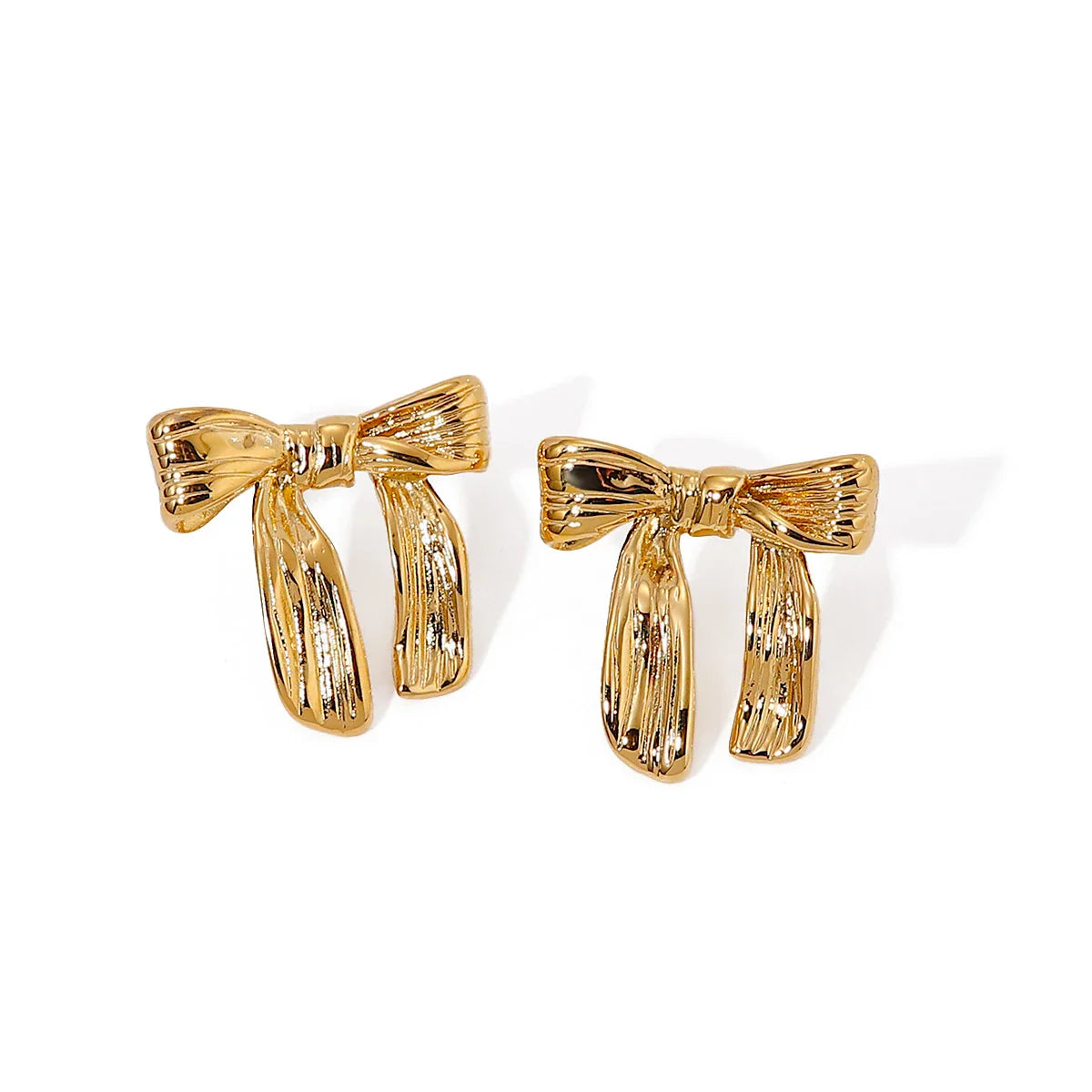 Feminine Textured Bow Earrings