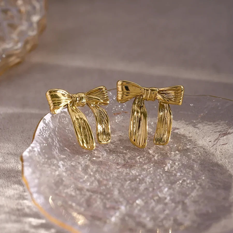 Feminine Textured Bow Earrings