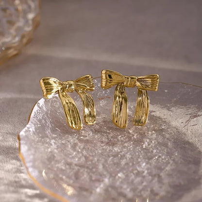 Feminine Textured Bow Earrings