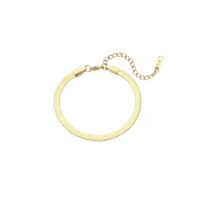 Gold bracelet on a white background