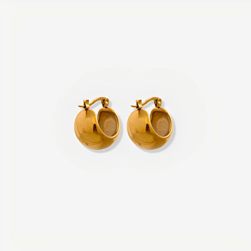 Gold hoop earrings on a white background