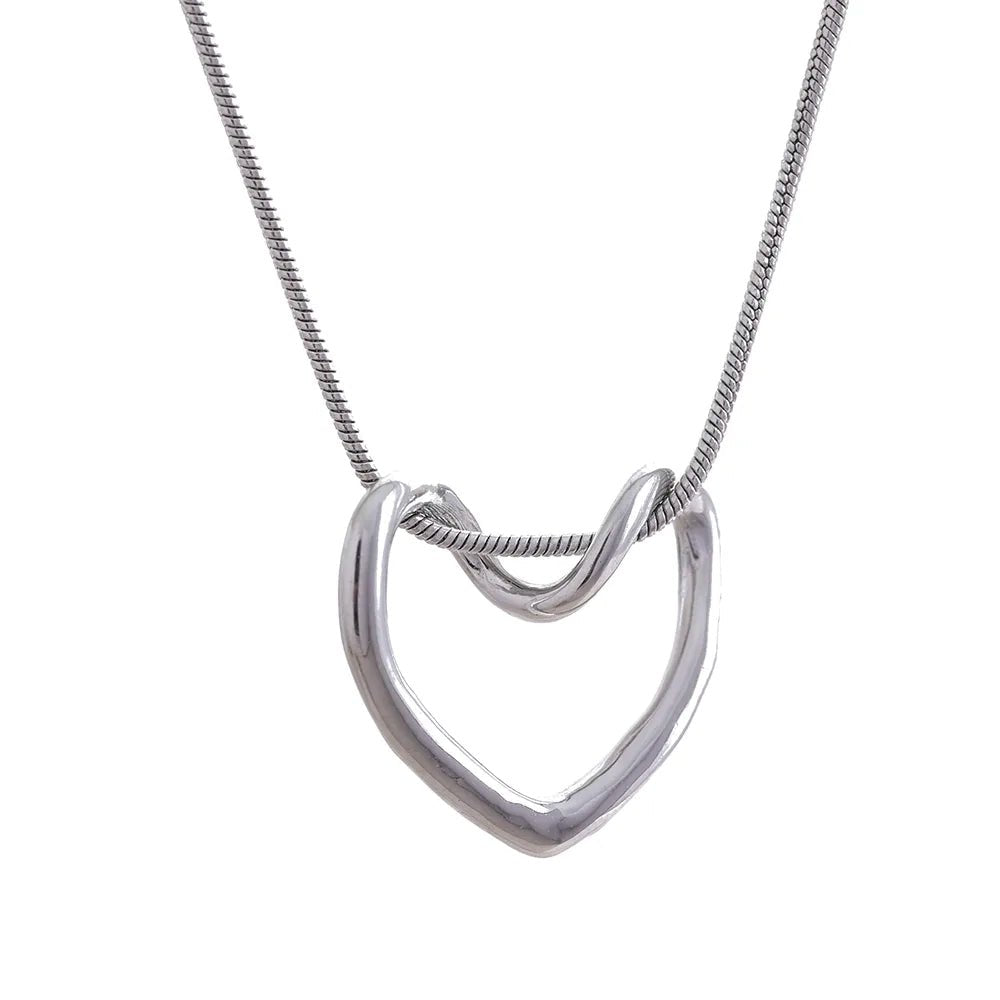 Silver necklace with a unique pendant on a white background