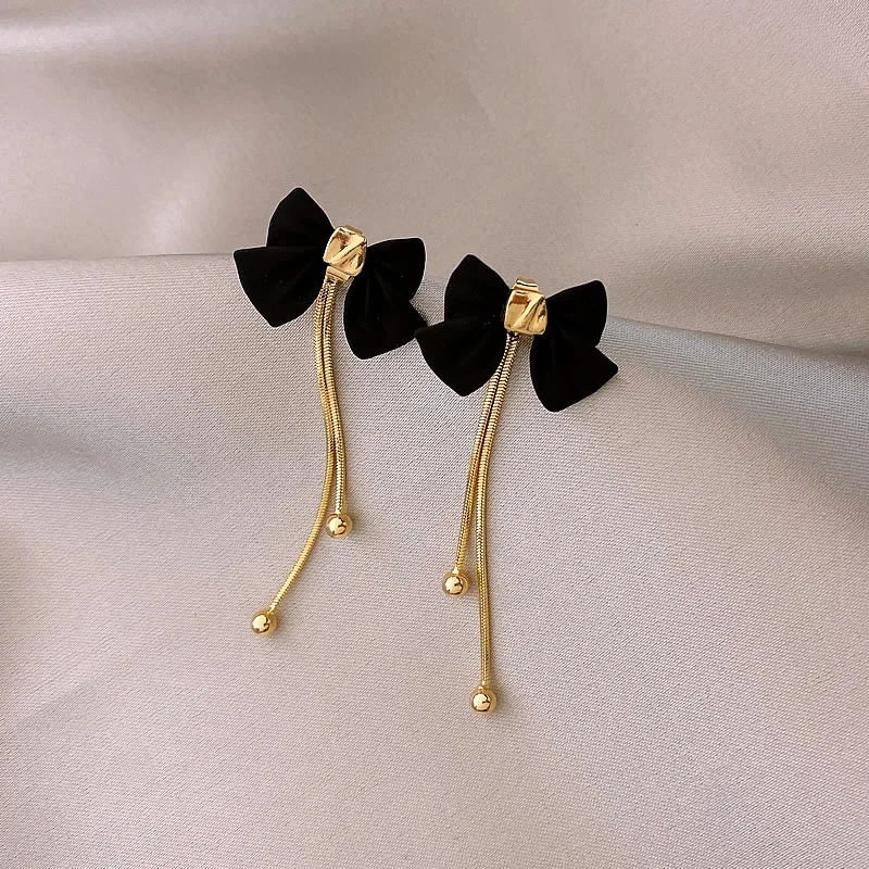 Dainty Bow Gold Dangle Earrings