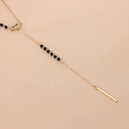Dainty Heart Black and Gold Lariat Necklace