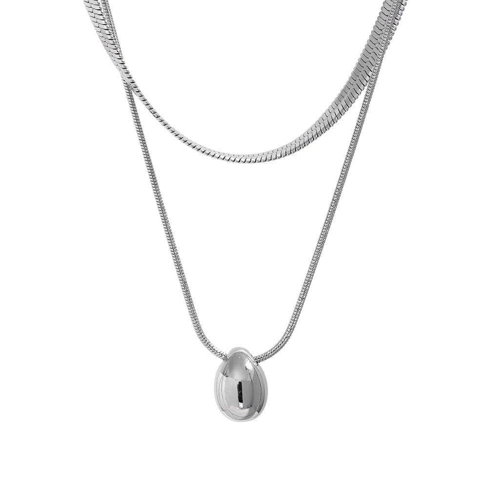 Silver necklace with a pendant on a white background