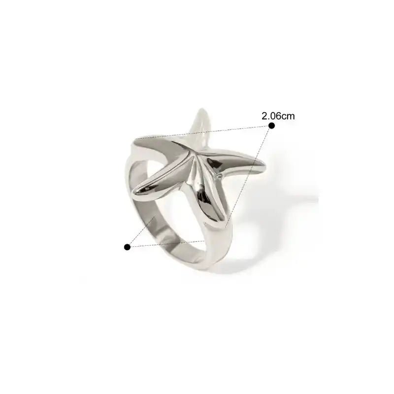 Silver ring with starfish design on a white background
