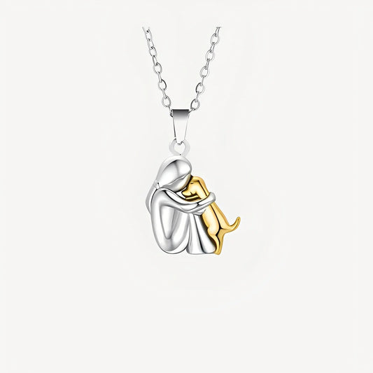 Necklace with a silver and gold pendant on a white background