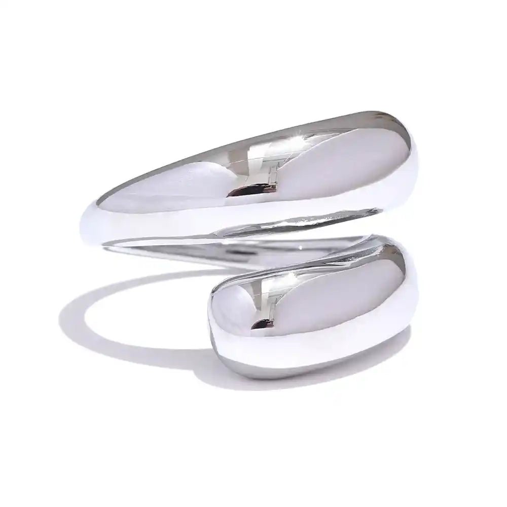 Silver spiral ring on a white background