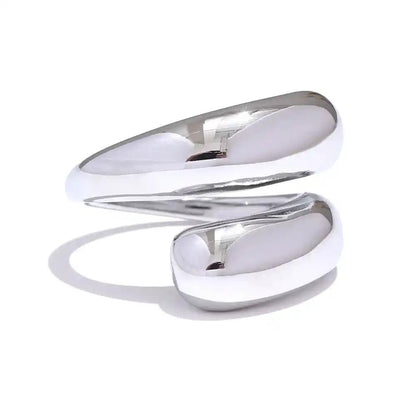 Silver spiral ring on a white background