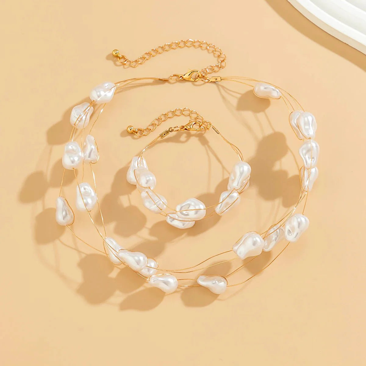 Layered Strung Pearls Bracelet and Necklace