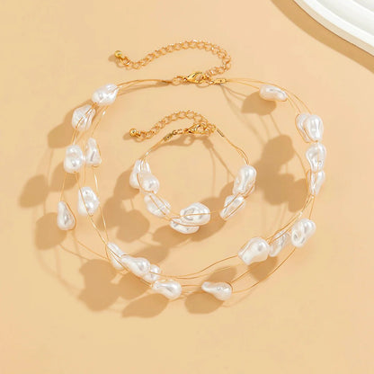 Layered Strung Pearls Bracelet and Necklace