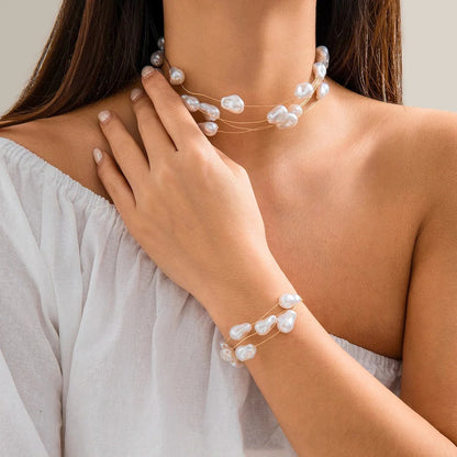 Layered Strung Pearls Bracelet and Necklace