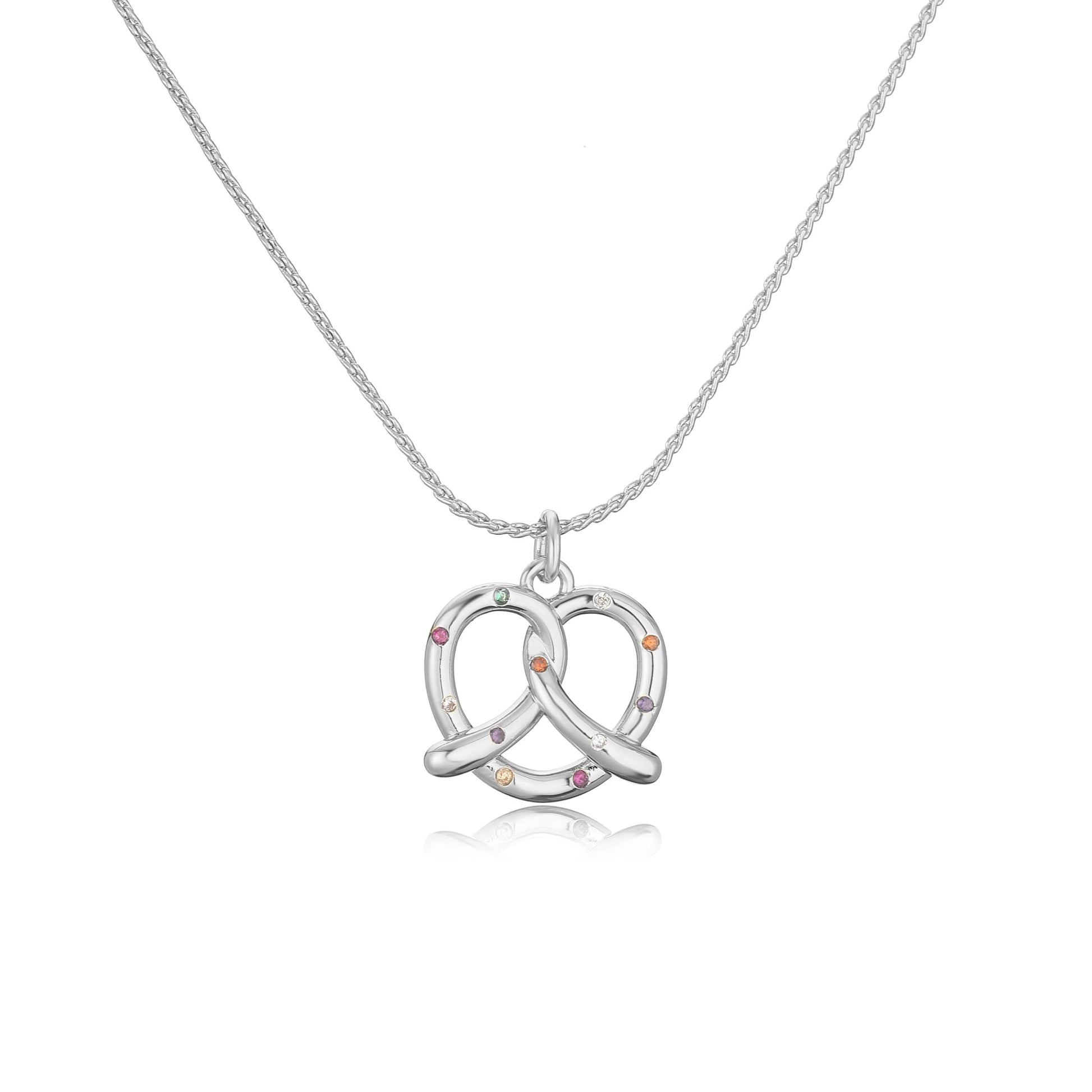 Silver necklace with a unique pendant on a white background