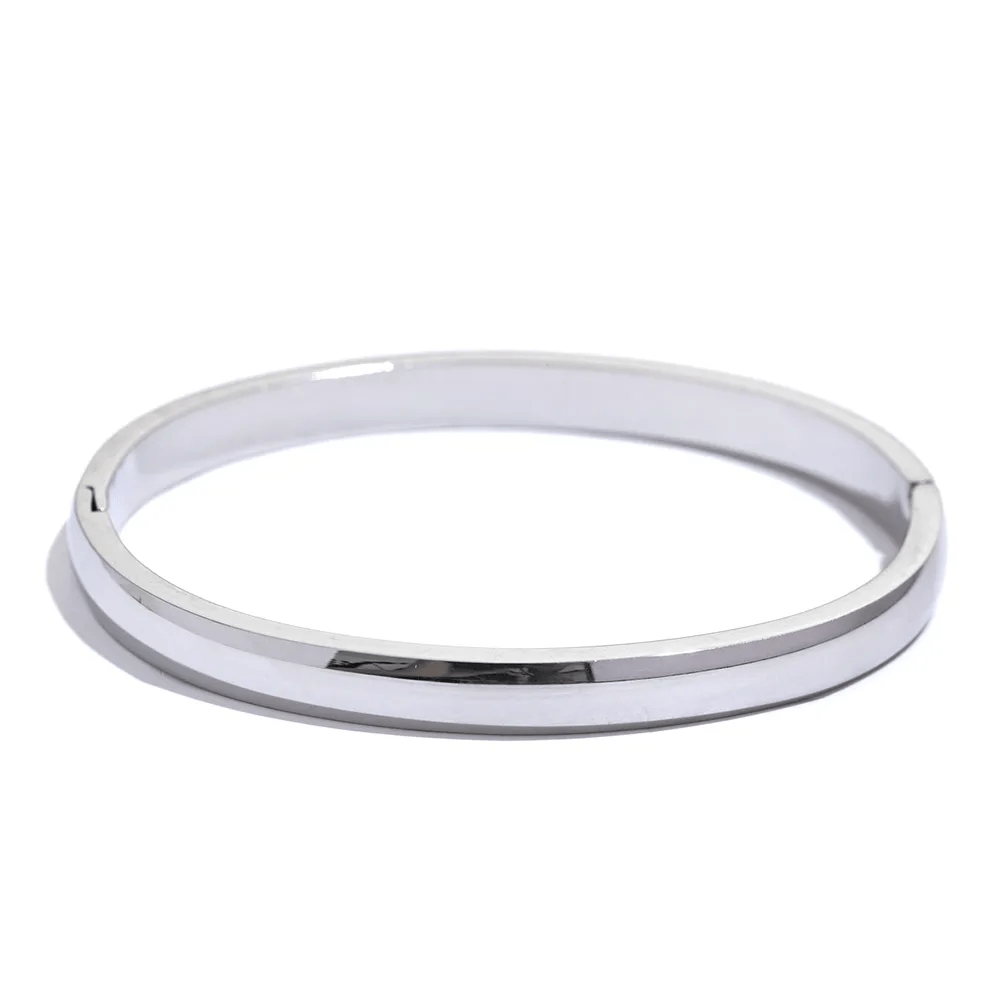 Silver bangle on a white background