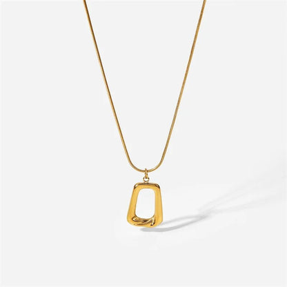 Gold necklace with a unique pendant on a white background