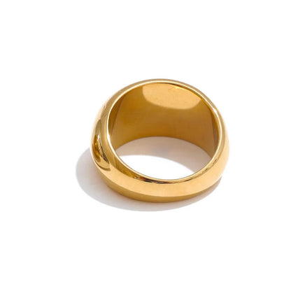 Gold ring on a white background