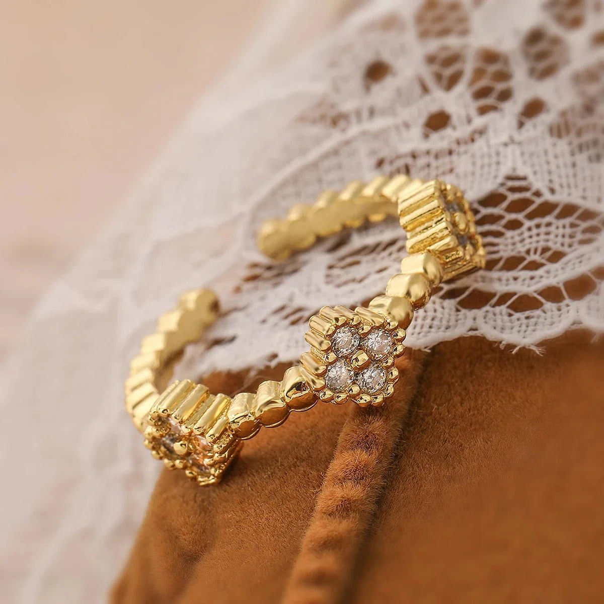 Resizable Trio Textured Floral Rings